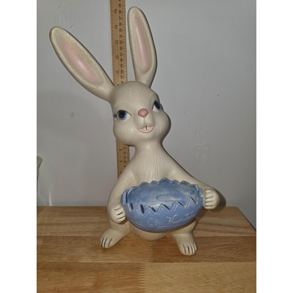 vintage ceramic Easter bunny figurine holding Egg